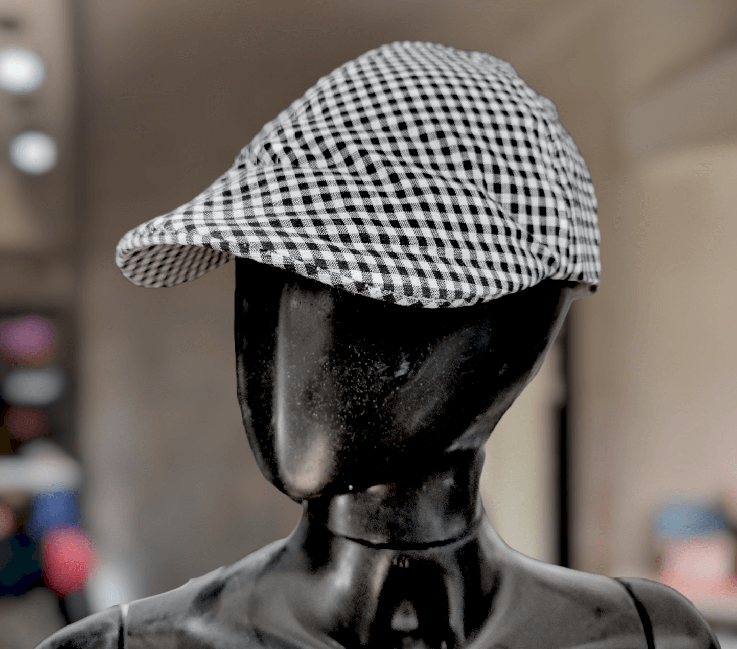 GORRA CON VISERA CUADRILLÉ B&N